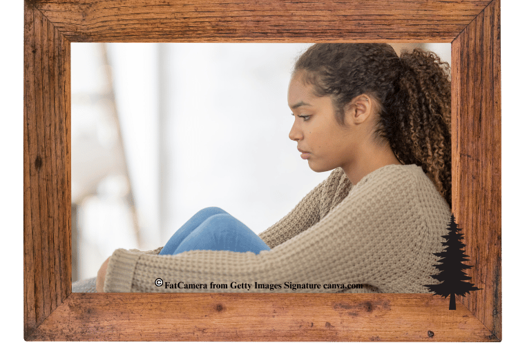Woman appearing sad and upset.