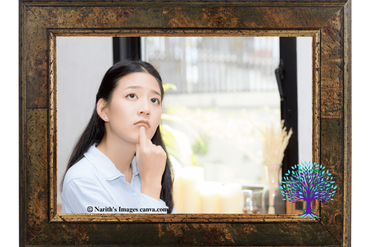 Woman who appears to be deep in thought.